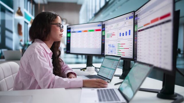 Healthcare Analyst Reviews Denial Management Dashboard On Laptop
