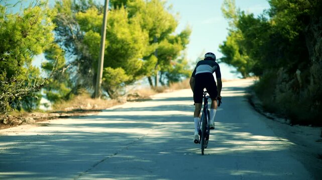 Cyclist Competing In Road Bicycle Race Event On Highway. Intense Sports Tournament