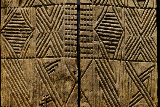 Carved geometric wood panel