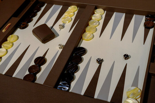Backgammon board with dice and pieces