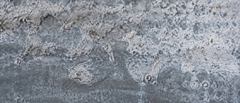 Corroded zinc coating texture with white rust and rough surface