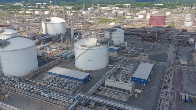 Drone view of liquefied natural gas storage tanks at an energy complex