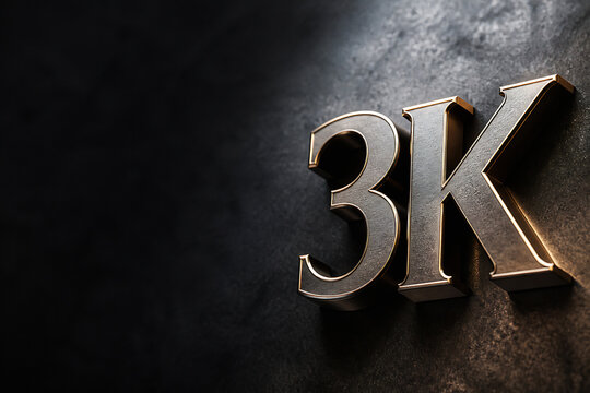Golden letters "3K" are displayed on a dark, textured surface in dramatic lighting.