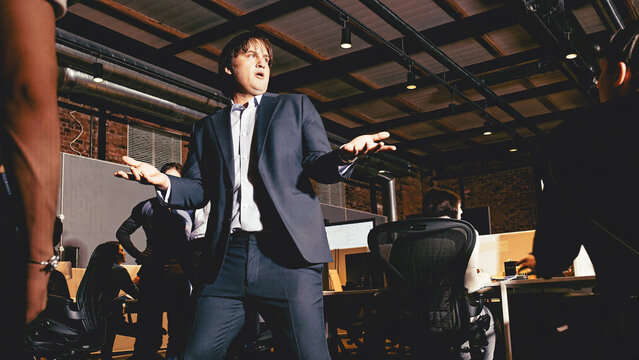 Businessman gesturing during office meeting