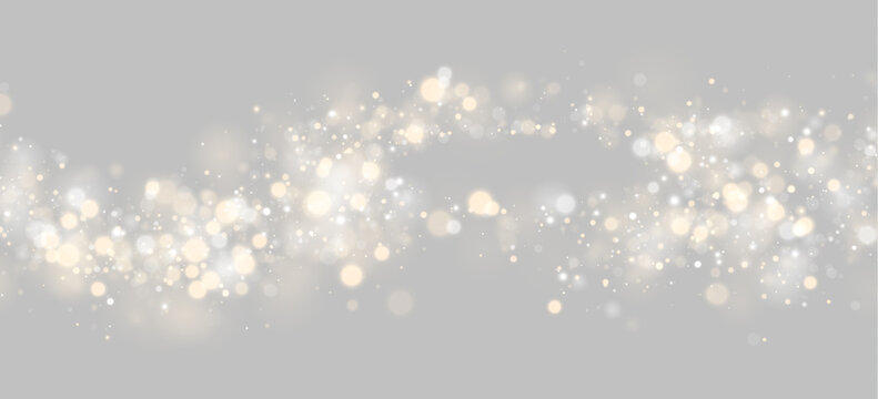 A horizontal stream of glowing bokeh lights with warm gold and cool silver tones highlights a festive and dreamy atmosphere. The scattered circular shapes vary in size and softly blur.