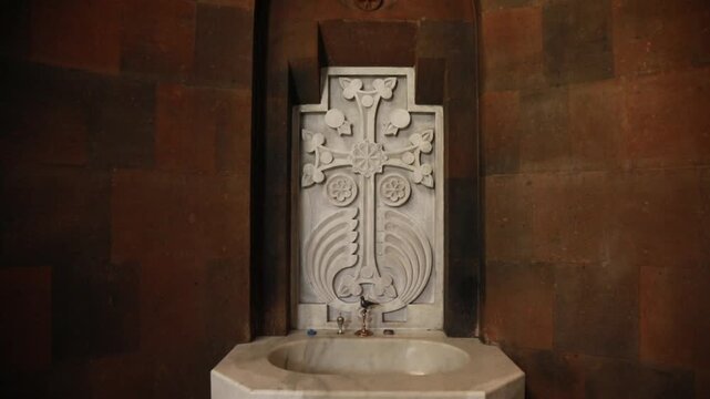 Close-up of a traditional Armenian Khachkar (cross-stone) inside the Surb Hovhannes church in Artashat.