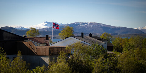 Norwegian flag in the arctic landscape of Bodø, Norway © Ivan Cernicky