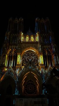 The light show Regalia on the facade of Reims Cathedral Notre-Dame de Reims. Reims, France, December 25, 2025. High quality 4k footage