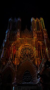 The light show Regalia on the facade of Reims Cathedral Notre-Dame de Reims. Reims, France, December 25, 2025. High quality 4k footage