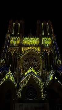 The light show Regalia on the facade of Reims Cathedral Notre-Dame de Reims. Reims, France, December 25, 2025. High quality 4k footage