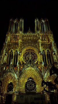 The light show Regalia on the facade of Reims Cathedral Notre-Dame de Reims. Reims, France, December 25, 2025. High quality 4k footage