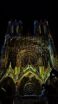 The light show Regalia on the facade of Reims Cathedral Notre-Dame de Reims. Reims, France, December 25, 2025. High quality 4k footage