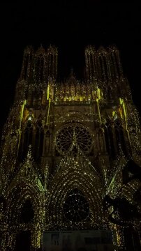 The light show Regalia on the facade of Reims Cathedral Notre-Dame de Reims. Reims, France, December 25, 2025. High quality 4k footage