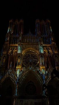 The light show Regalia on the facade of Reims Cathedral Notre-Dame de Reims. Reims, France, December 25, 2025. High quality 4k footage