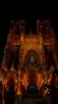 The light show Regalia on the facade of Reims Cathedral Notre-Dame de Reims. Reims, France, December 25, 2025. High quality 4k footage