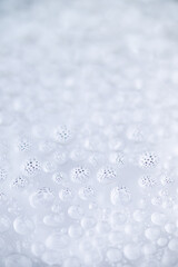 Close up of Black and White Abstract Water Drops on Glass Background © Anna Hoychuk