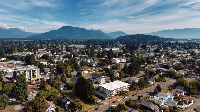 Aerial view of Chilliwack neighborhoods with mountain backdrop, BC