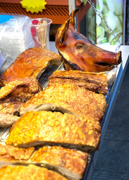 Roasted crispy pig head and crackling ,at a night market in Vientiana,Laos.