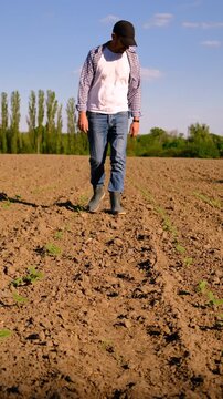 Farmer in the field. Selective focus.