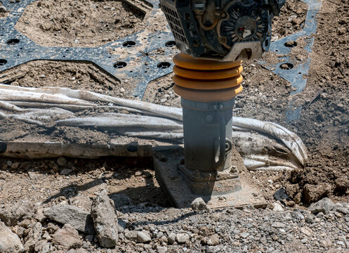 Tamping Rammer Working Beside Exposed Utility Cables