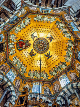 Aachen, Germany, Europe - July 29, 2026: Inside the Cathedral, the Dom. Mosaic of central dome/vault of Charlemagne's Carolingian Octagon. Christ enthroned, surrounded by the Twenty-Four Elders of the
