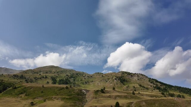 scenic view of the colle della maddalena, col de larche, mountain pass at 1991 meters elevation, connecting valle stura in piedmont, to the french alps. ideal for travel, transportation and nature 