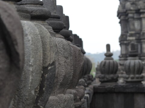 Close up of intricate hand carved stone details on temple