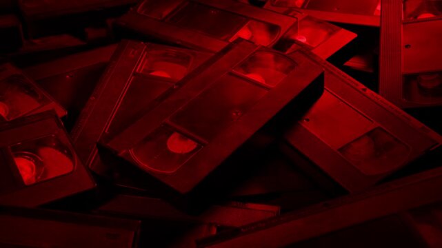 Lots Of Video Tapes In Red Light