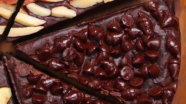 Top view shot of a chocolate chip fudge brownie rotating.
