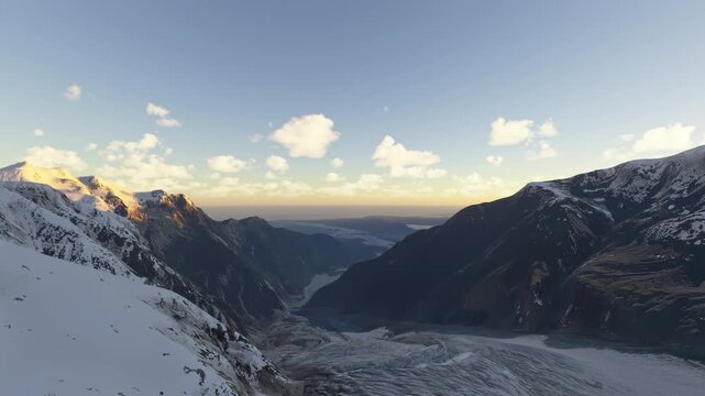 Sunrise drone aerial view of the snow in Franz Josef Glacier in West Coast Region. New Zealand