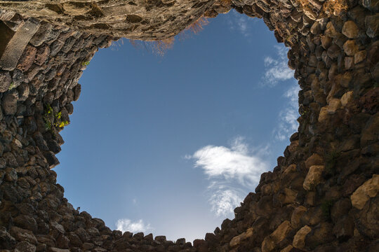 Italy, Sardinia, Barumini.  Monumental quadrilobate Nuraghic complex dating to 14th century BC.  A UNESCO World Heritage site.