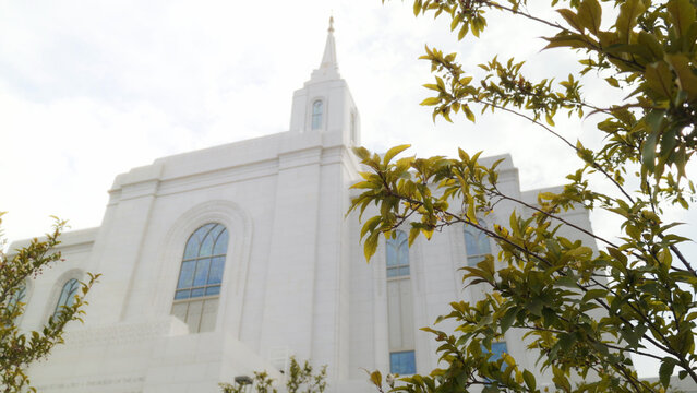 Orem Utah Temple Framed by Green Tree Branches in Orem, Utah
