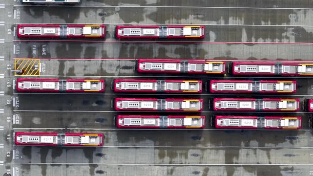 Aerial top down view of public buses parked in a depot at Seattle