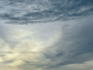 Fototapeta premium Warm Sunlight and Clouds in the Sky During Sunset