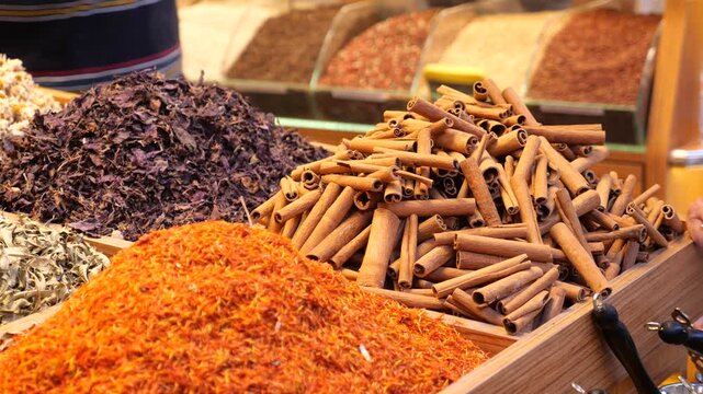 Vendor in a bustling market expertly collecting cinnamon sticks for a customer creating a dynamic scene of commerce and tradition