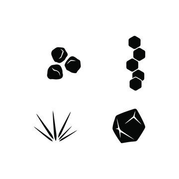 Set of four black geometric featuring clusters of small stones, a vertical hexagonal stack, a sharp starburst, and a single faceted rock shape