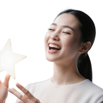 Woman star laughing happy young Asian woman holding a glowing star on a transparent background celebrating success and joy