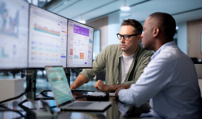 Fototapeta premium Treasury Manager Reviews Real-time Cash Flow On Laptop