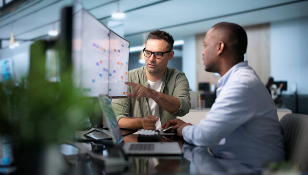 Business Analyst And Engineer Collaborate