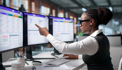 Fototapeta premium Human Resources Manager Carefully Reviews Employee Benefit Enrollment
