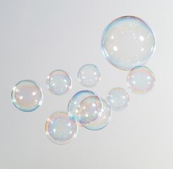Fototapeta premium Colorful soap bubbles floating against white background