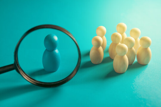 Magnifier and figures of people on Search for employees.