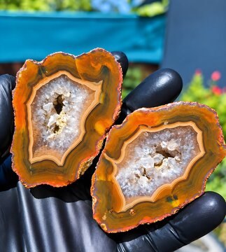 Stunning agate geode slice pair with clear quartz crystal center