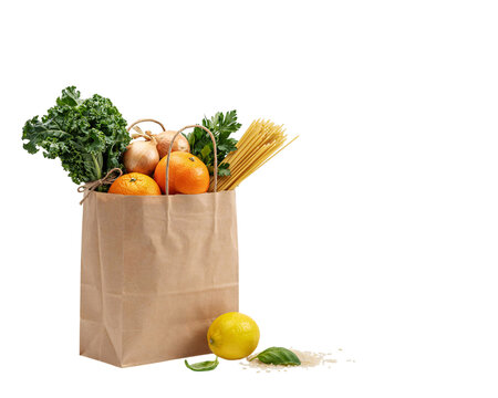 Brown paper grocery bag filled with fresh produce and pasta solated on transparent background