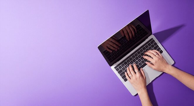 Top view of hands typing on a laptop computer placed on a solid purple background with computer while wearing against vibrant purple wearing digital watch silver laptop, 8K Resolution