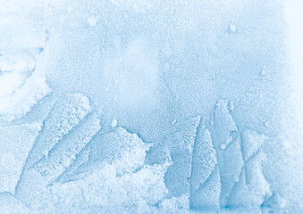 Abstract winter background with texture of ice covered with hoarfrost and fresh snow crystals. Winter frozen frame. Copy space  © IULIIA