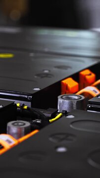 Close-up view of automotive service equipment and electronic diagnostic components used during professional vehicle inspection and maintenance procedures. The image represents modern automotive techno