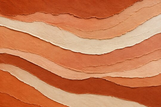 Textured abstract paper layers in warm earthy tones during soft diffused light