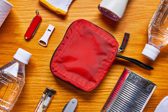 Disaster Preparedness Kit on Wooden Table