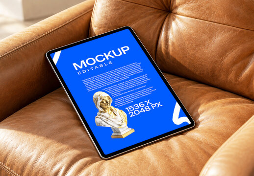 Tablet Screen Mockup on Luxury Leather Sofa
